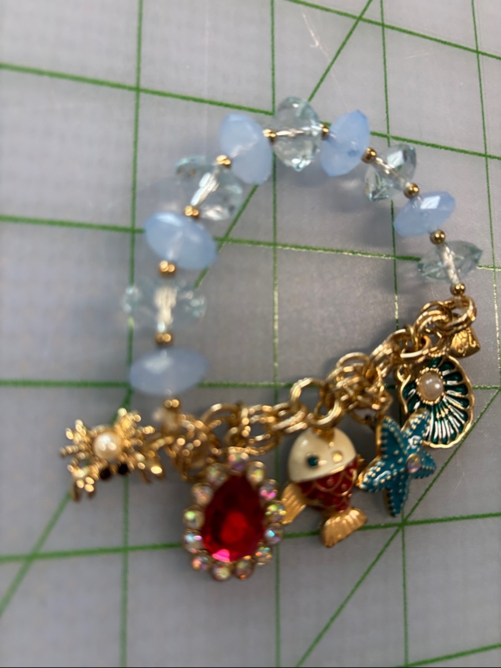Gold Charm Bracelet with Light Blue Beads and Ocean Charms - Picture 3 of 3